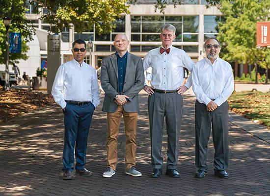 从左到右:博士. Farooq Khan, 澳门新普京注册 professor of chemistry; Dr. John Hansen, 澳门新普京注册 professor of chemistry; Dr. Martin McPhail, 澳门新普京注册 associate professor of chemistry; and Dr. Ajith DeSilva，物理学教授